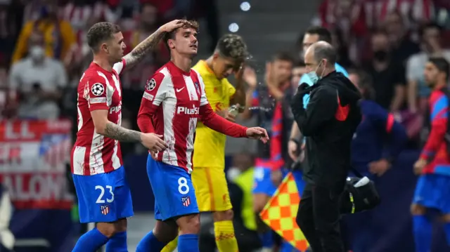 Griezmann leaves the field after being sent off