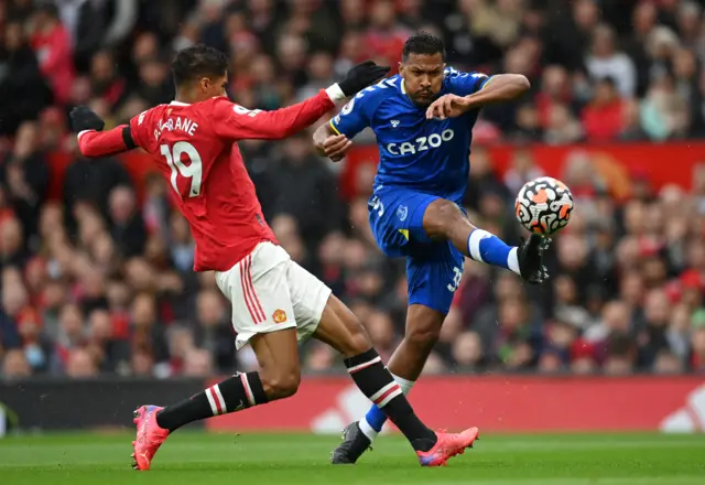 Rapahael Varane challenges Salomon Rondon