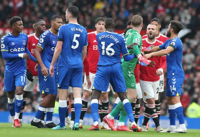 Manchester United and Everton players clash