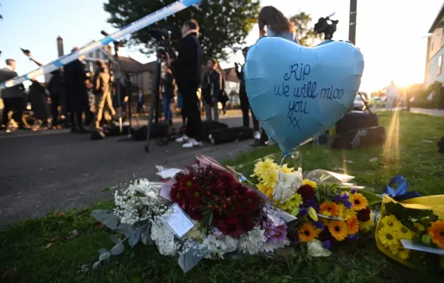 tributes at the scene of a crime where MP for Southend West, Sir David Amess,