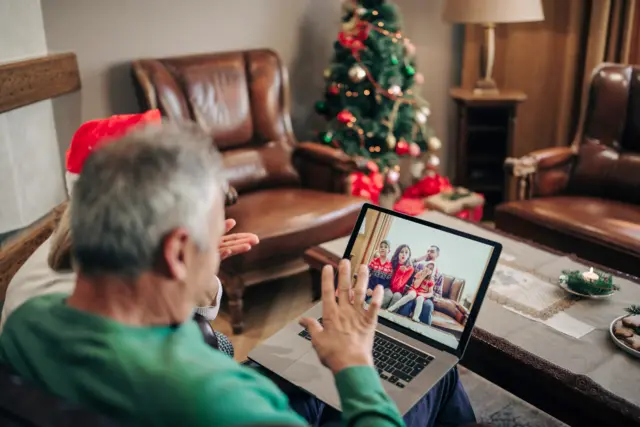 Family having a virtual call on Christmas