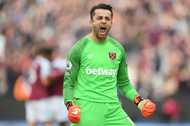 Lukasz Fabianski celebrates as West Ham beat Tottenham