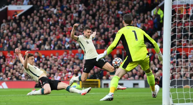 Diogo Jota slides in to score Liverpool's second goal against Manchester United