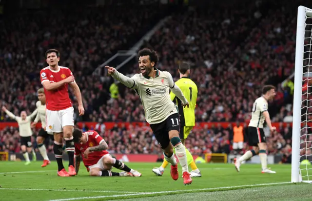 Mohamed Salah celebrates scoring for Liverpool against Manchester United