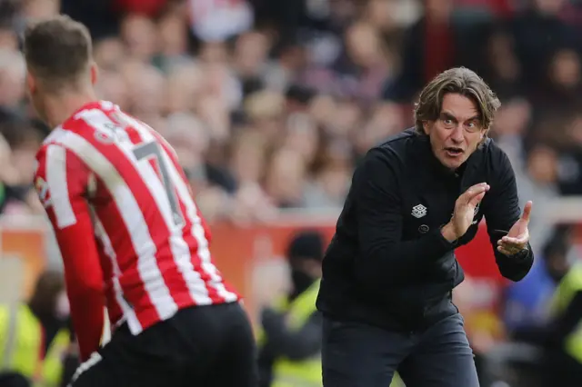 Brentford boss Thomas Frank encourages his players