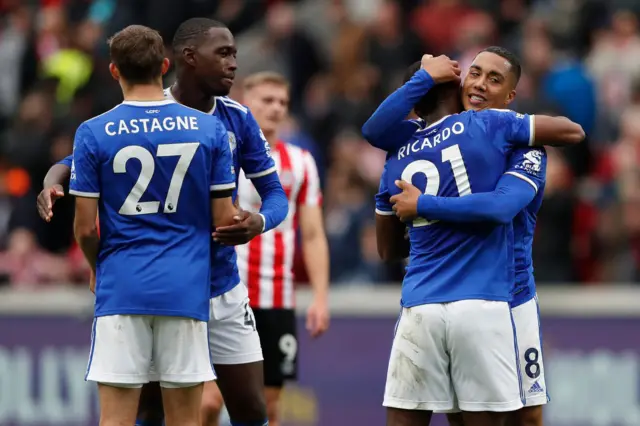 Leicester's players celebrate beating Brentford