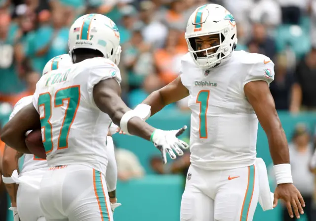 Isaiah Ford and Tua Tagovailoa celebrate a touchdown