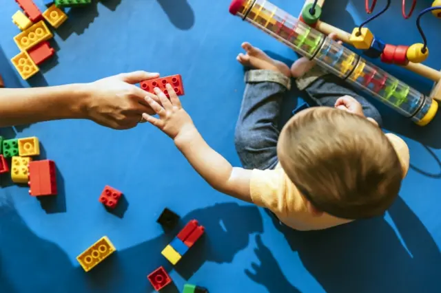 Child playing in nursery