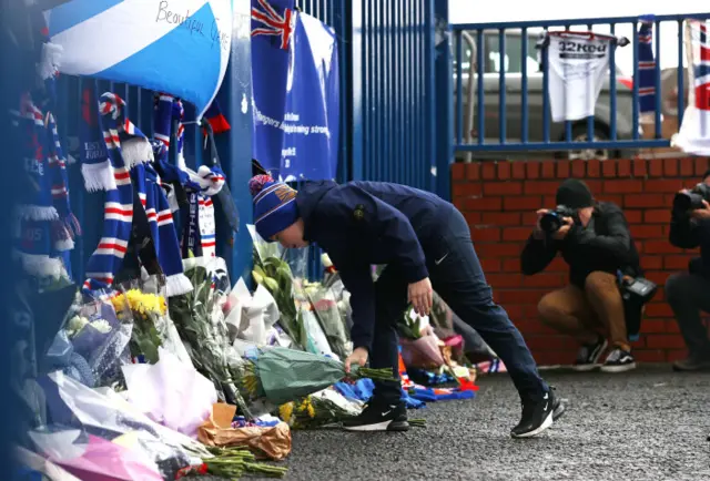 Rangers supporters leave tributes to the late Walter Smith outside Ibrox