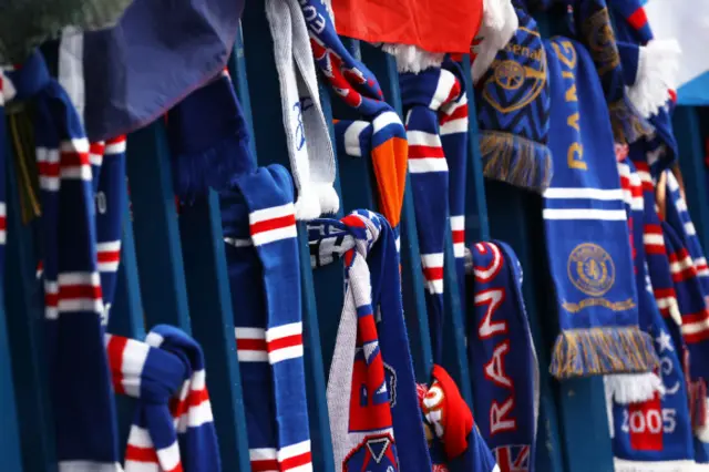 Rangers scarves tied to railings outside Ibrox