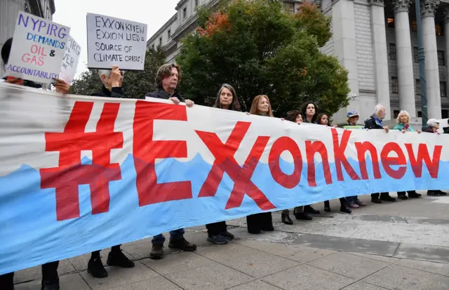 protesters at exxon trial in 2019