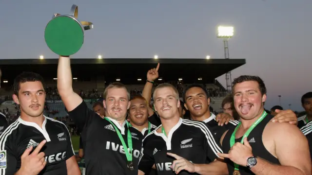 Gareth Anscombe celebrates with New Zealand U20 teammates after winning the 2011 Junior World Cup