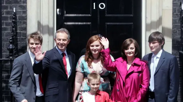 Tony Blair leaving Downing Street with his wife Cherie, and his children in 2007