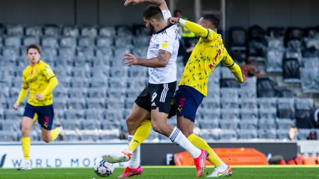 Kyle Bartley fouls Aleksandar Mitrovic