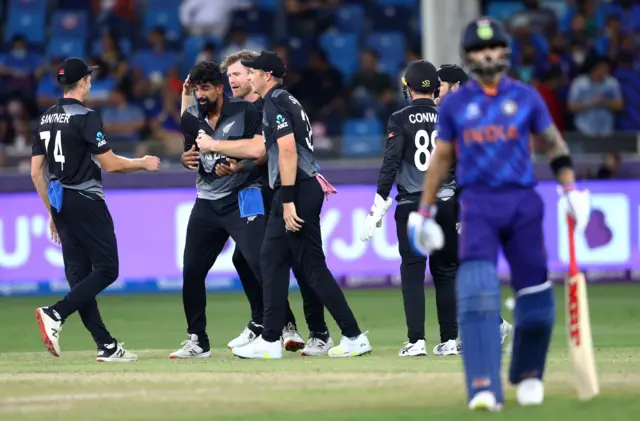 New Zealand celebrate Kohli wicket