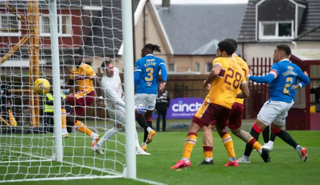 Bevis Mugabi scores for Motherwell against Rangers