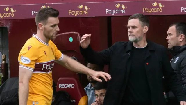 Motherwell manager Graham Alexander (right) with Stephen O'Donnell, who was sent off