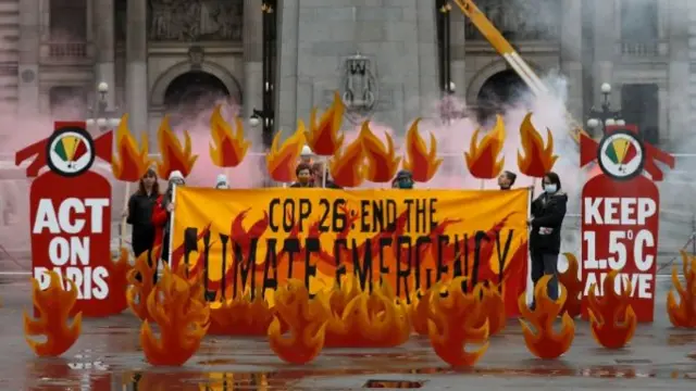 An art installation of faux flames and smoke ahead of the UN Climate Change Conference (COP26), in Glasgow,