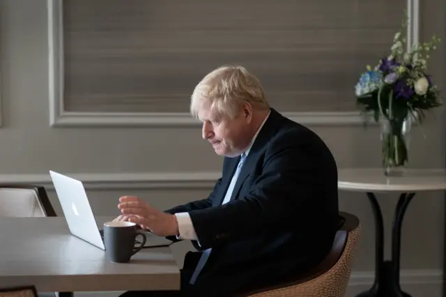 Boris Johnson preparing his speech in his hotel room on Tuesday