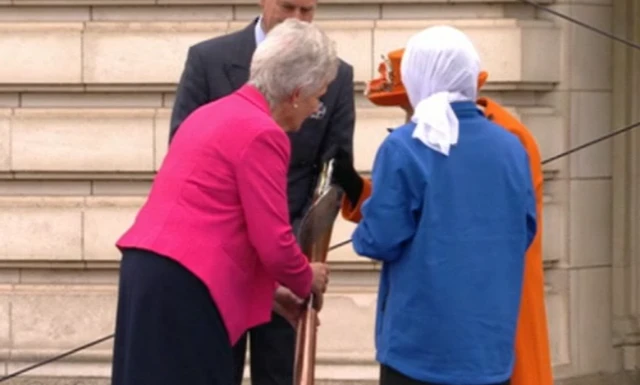 Queen and baton