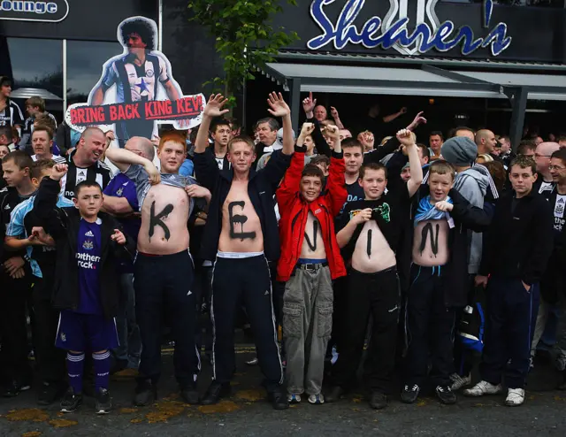 Supporters with Kevin painted on their chests