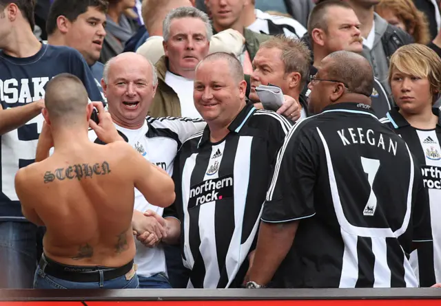 Mike Ashley with fans