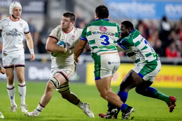 Nick Timoney tries to escape the attention of Ivan Nemer and Cherif Traoré