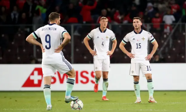 Dejected Northern Ireland players