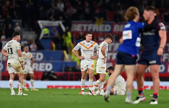 Dejected Catalans players