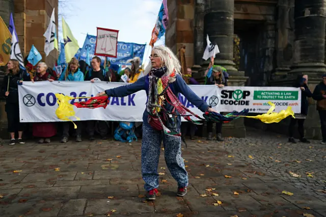 Pilgrimage groups who have walked to Glasgow are joined by members of the group, Extinction Rebellion