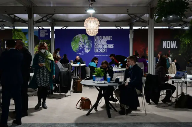 Delegates attend the COP26 UN climate change conference at the Scottish Event Campus (SEC) in Glasgow