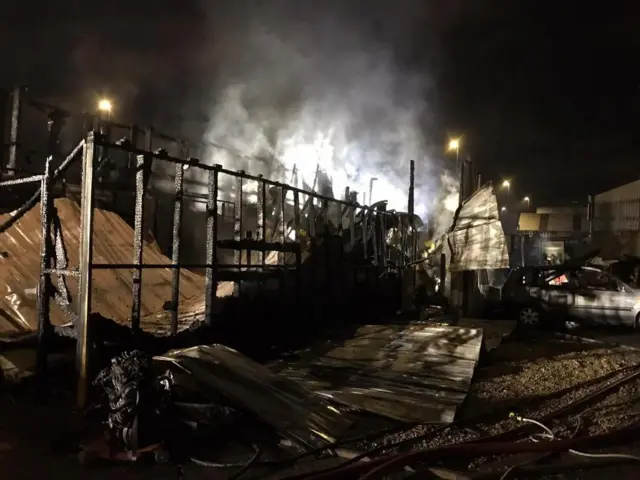 Aftermath of the fire in Byker showing damaged fencing and hoarding