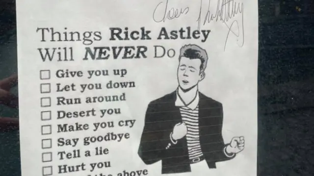 The poster of Rick Astley's lyrics