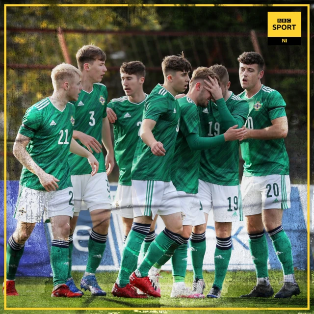 Northern Irelands Alfie McCalmont scores an early goal against Lithuania