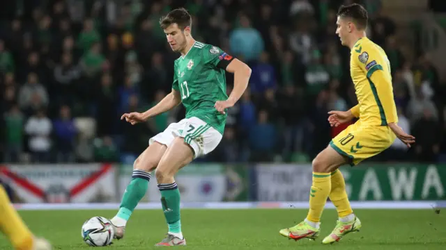 Paddy McNair with Fedor Cernych