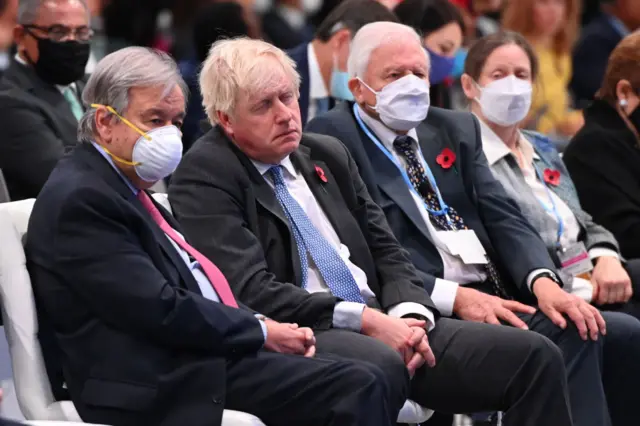 British prime minister Boris Johnson was pictured maskless and asleep inside the hall