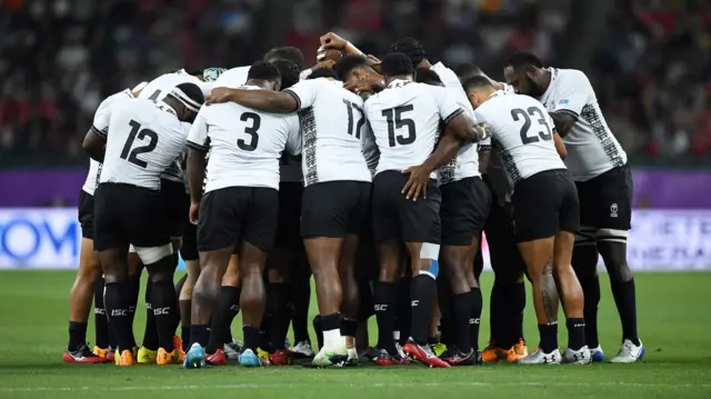 Fiji team huddle