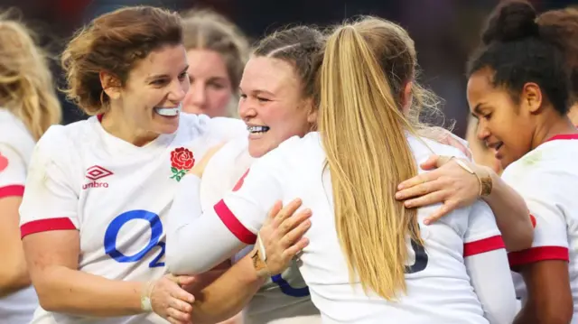 Sarah Hunter celebrates with Sarah Bern