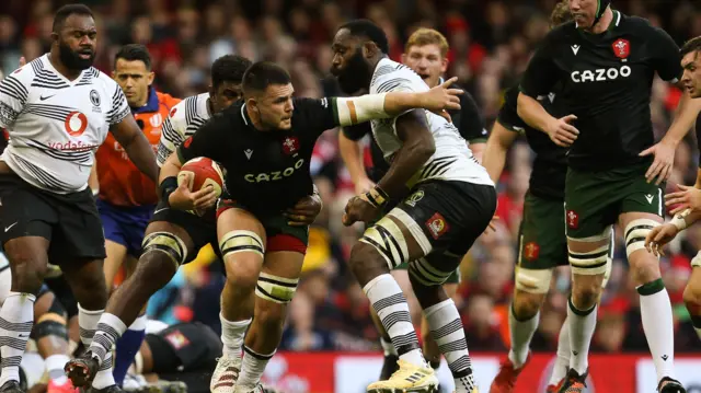 Ellis Jenkins carries for Wales