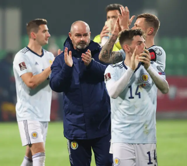 Scotland manager Steve Clarke and the players applaud fans in Moldova