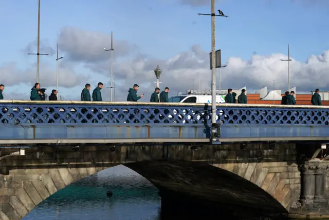 Italy players walk in Belfast