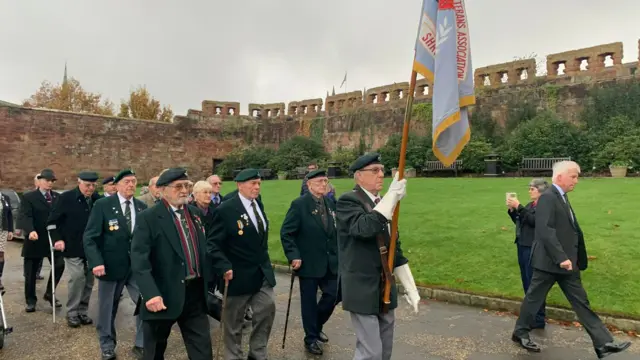 Veterans with flag