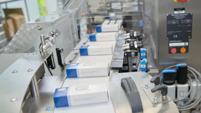 Paxlovid packages being processed