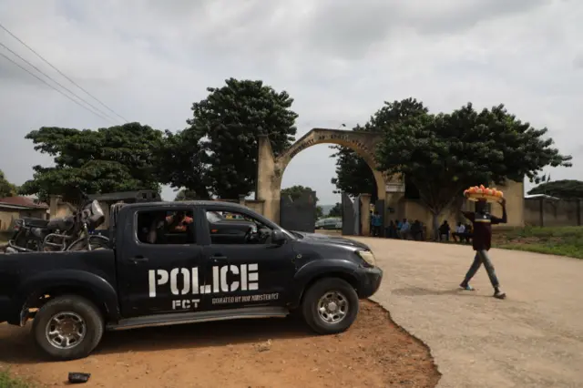 A police vehicle is stationed outside the University of Abuja Staff Quarters, 2 November, 2021