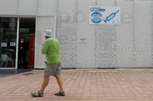 Tourist outside vaccine centre in Benidorm