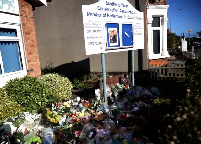 Floral tributes left outside Sir David's constituency office in Southend