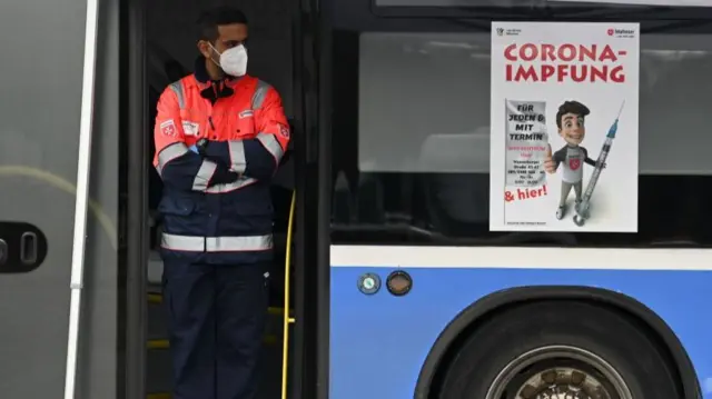 A man at a vaccine bus