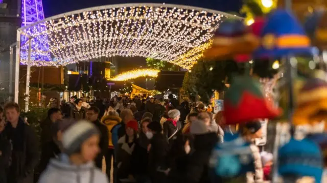 People at a Christmas market in Innsbruck, Austria