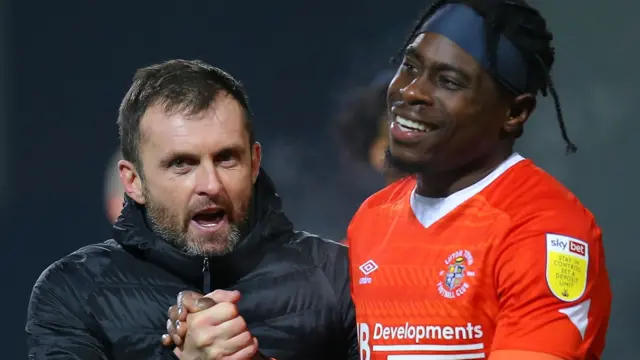 Luton boss Nathan Jones with midfielder Pelly-Ruddock Mpanzu