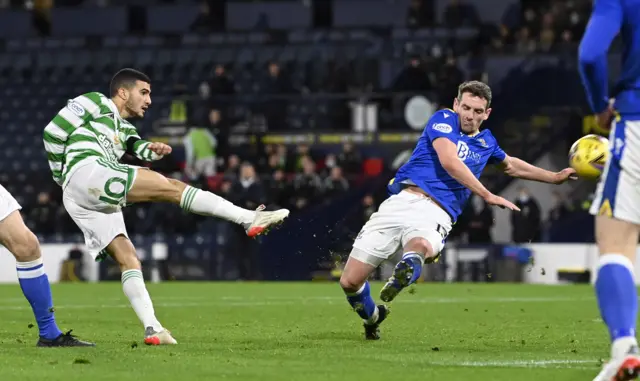 Celtic's Liel Abada has a shot on goal that Craig Bryson blocks